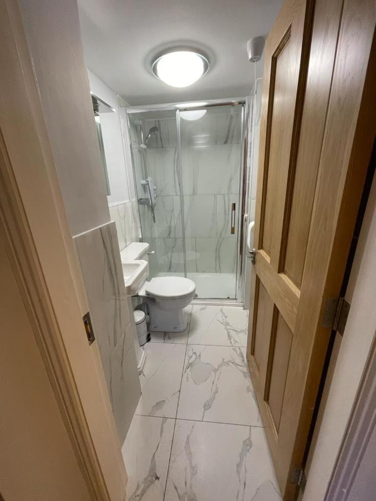 Apartamento The Post House Kinsale Habitación foto